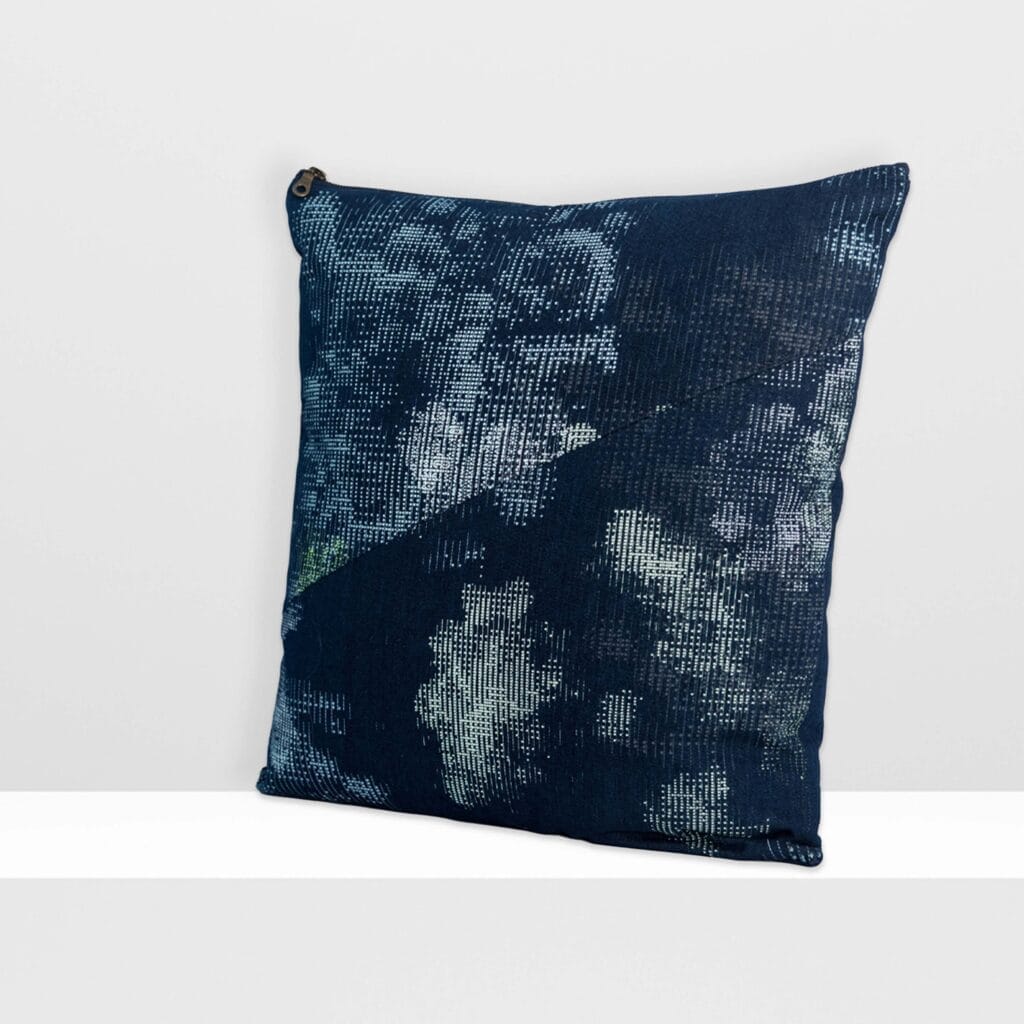 Front view of Digital Moss large pillow by MIN-studio, screen-printed denim with layered abstract moss-like textures in blue, white, grey, and glow yellow inks.