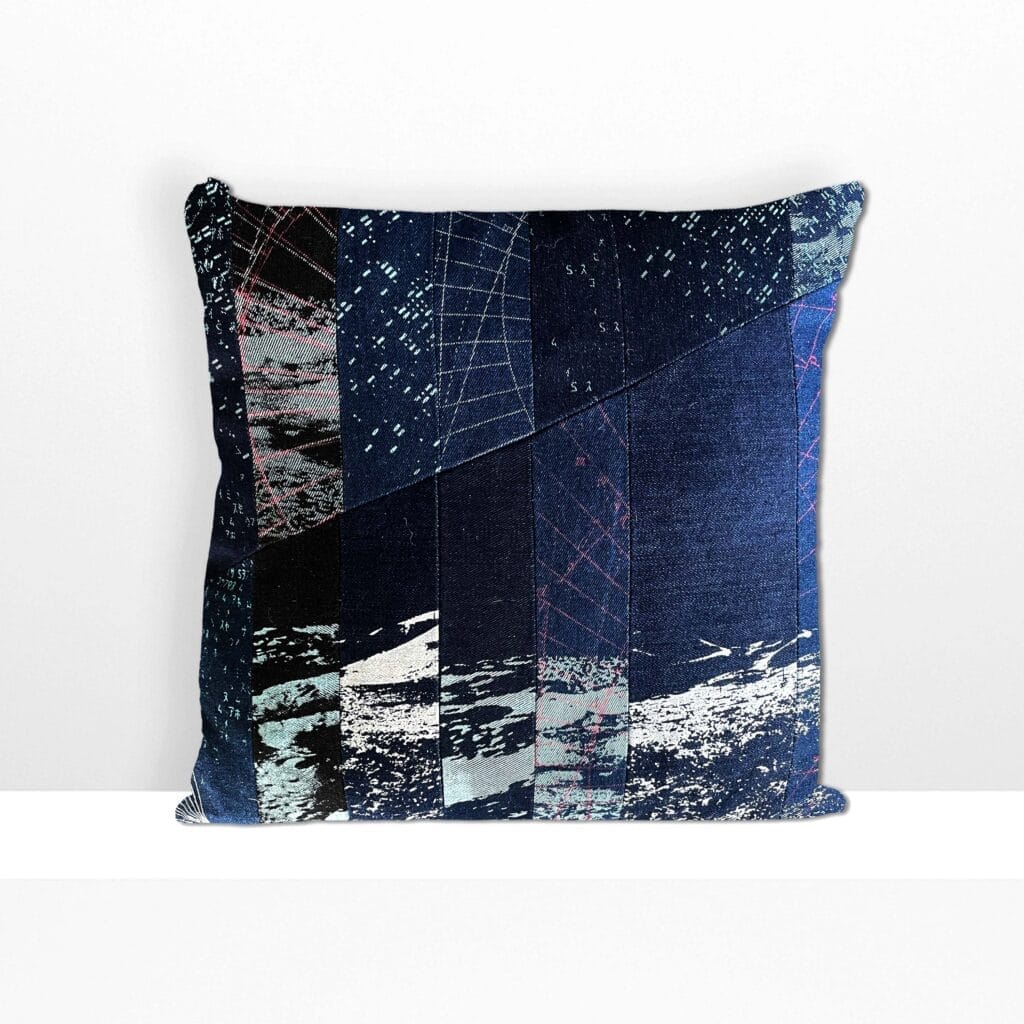 Front view of Space Collection large pillow by MIN-studio, screen-printed denim with layered moon surface textures in blue, grey, and neon pink inks, featuring edgy, grunge-inspired abstract patterns.