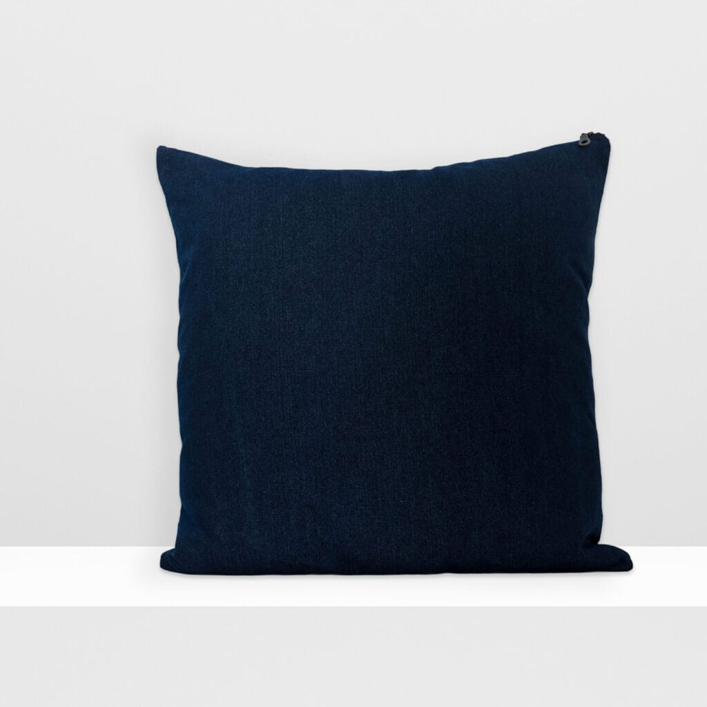 Back view of Digital Moss large pillow by MIN-studio, screen-printed denim with layered abstract moss-like textures in blue, white, grey, and glow yellow inks.