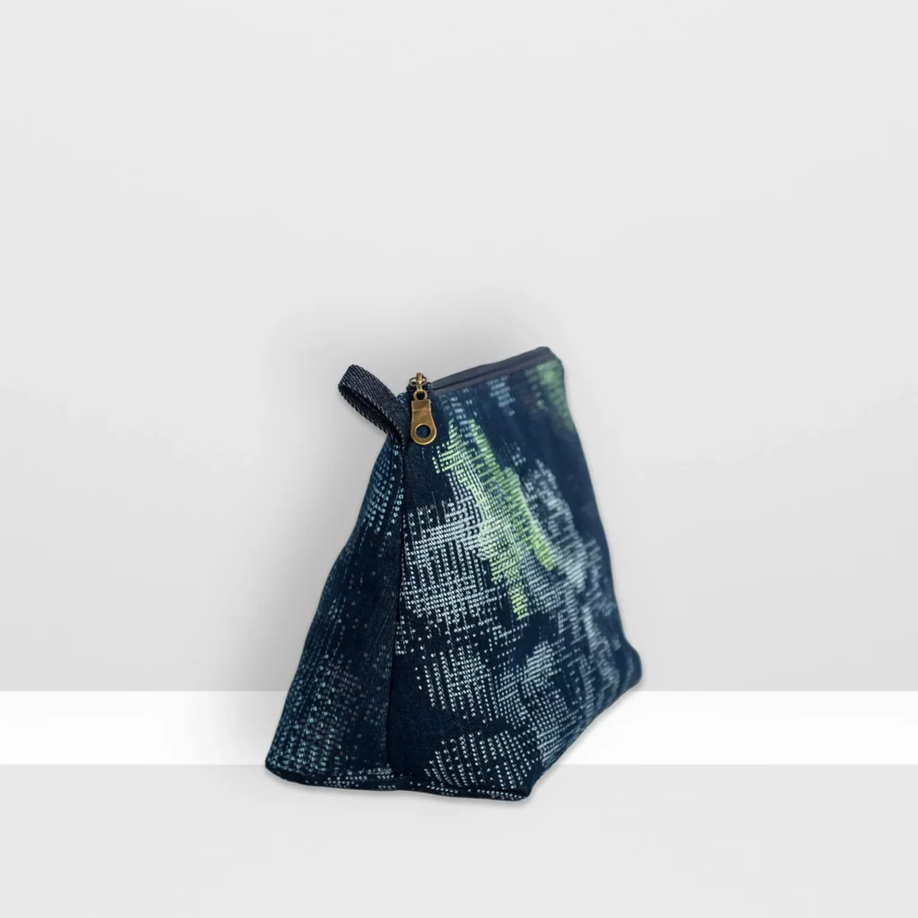 Large Digital Moss beauty bag by MIN-studio with glow yellow layered screen print forming abstract moss textures on denim patchwork.