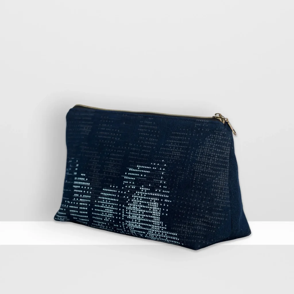 Back view of large Digital Moss beauty bag showing grey-blue screen-printed moss pattern and patchwork construction.