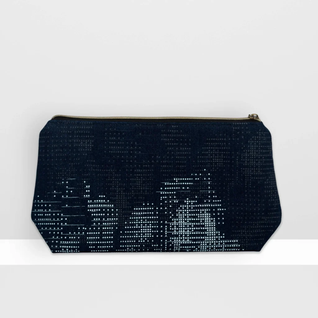 Back view of large Digital Moss beauty bag showing grey-blue screen-printed moss pattern and patchwork construction.