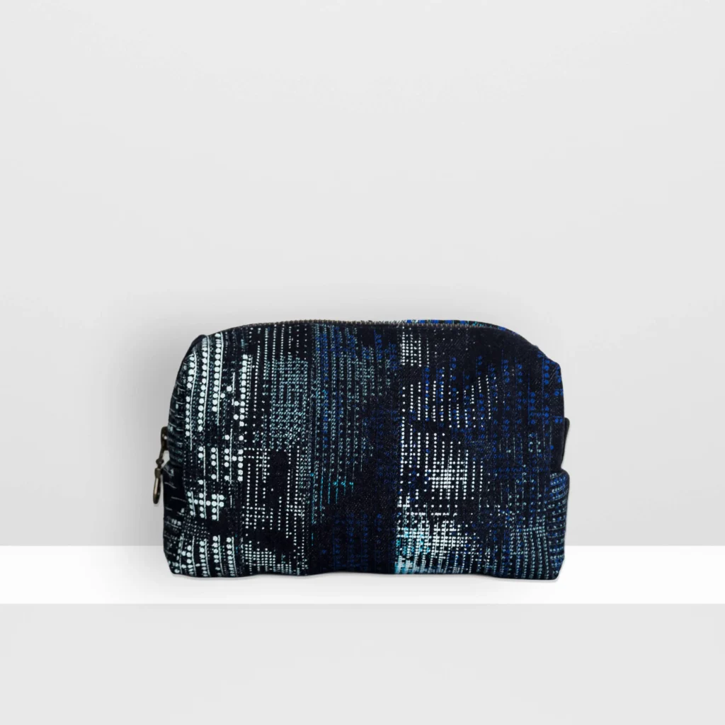 Back view of medium Digital Moss beauty bag with layered blue screen-printed moss pattern on denim by MIN-studio.
