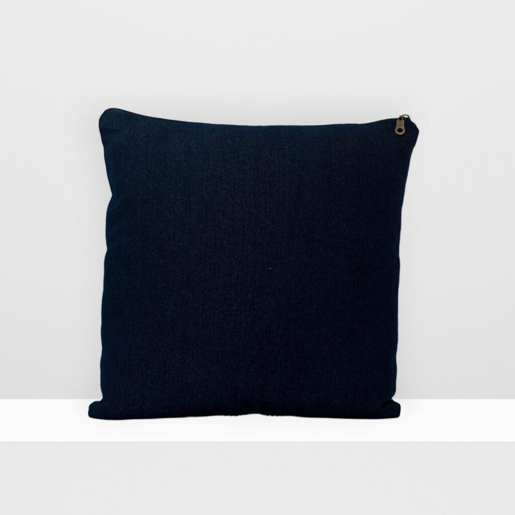 Back view of Digital Moss medium pillow by MIN-studio, screen-printed denim with layered abstract moss-like textures in blue, white, grey, and glow yellow inks.