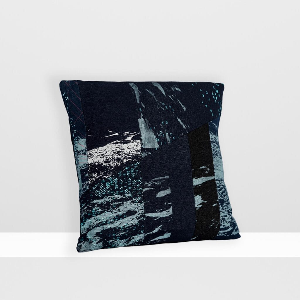 Front view of Space Collection medium pillow by MIN-studio, screen-printed denim with layered moon surface textures in blue, grey, and neon pink inks, featuring edgy, grunge-inspired abstract patterns.