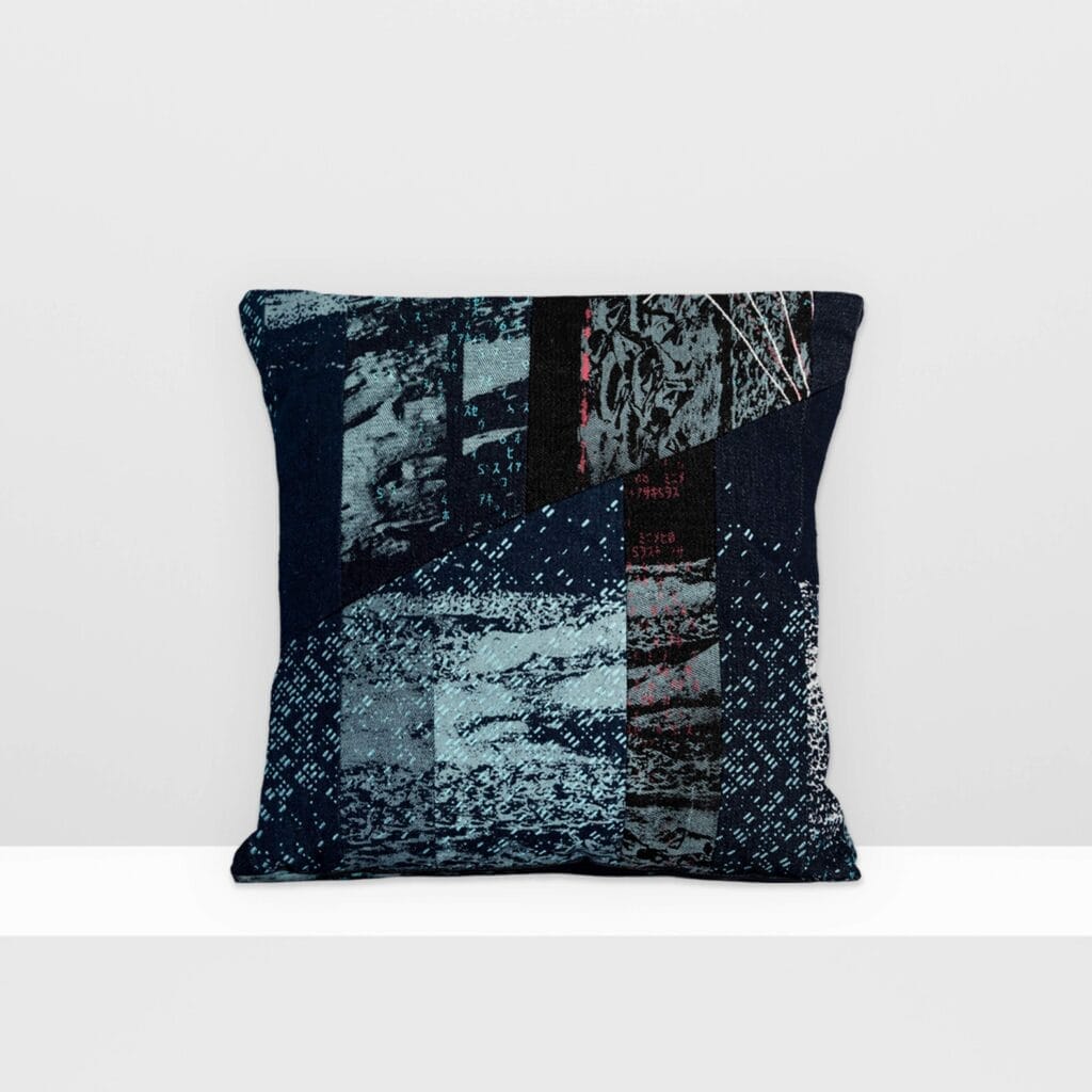 Front view of Space Collection medium pillow by MIN-studio, screen-printed denim with layered moon surface textures in blue, grey, and neon pink inks, featuring edgy, grunge-inspired abstract patterns.