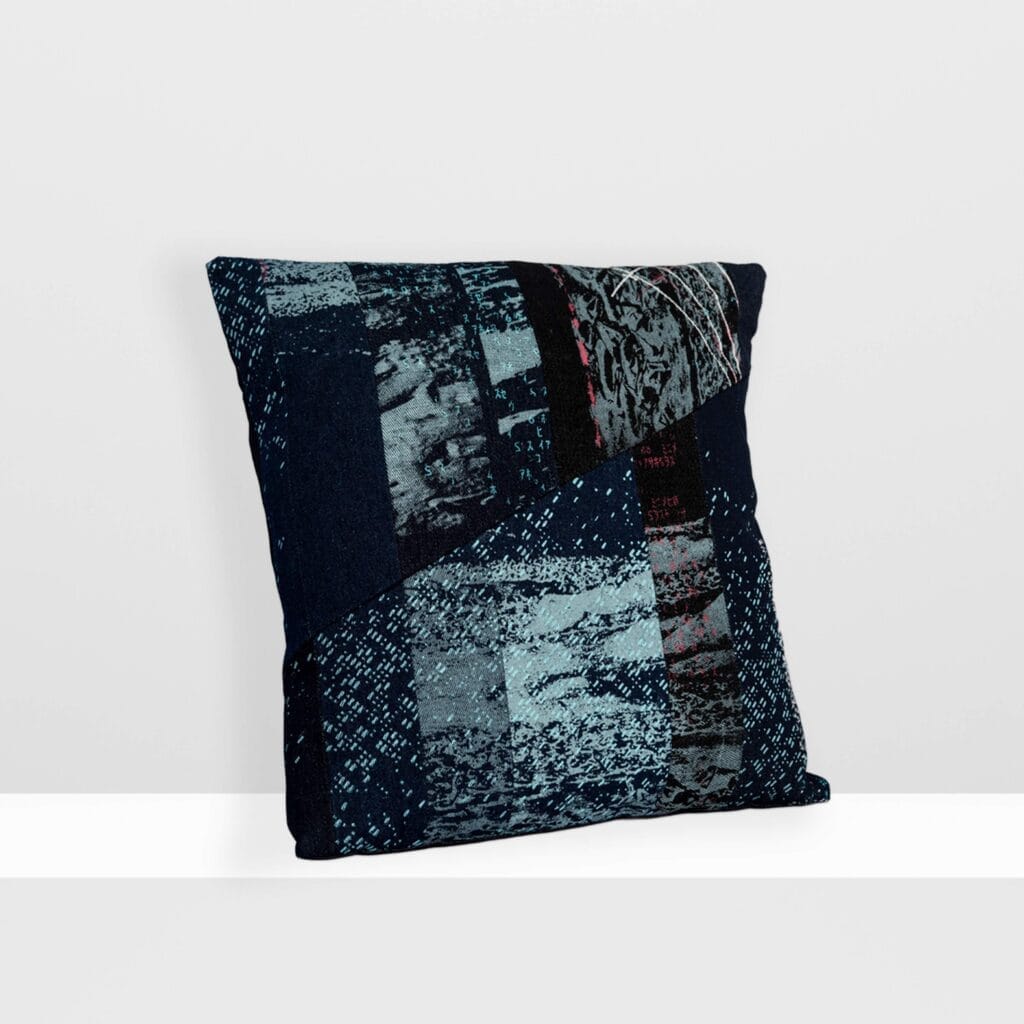 Front view of Space Collection medium pillow by MIN-studio, screen-printed denim with layered moon surface textures in blue, grey, and neon pink inks, featuring edgy, grunge-inspired abstract patterns.