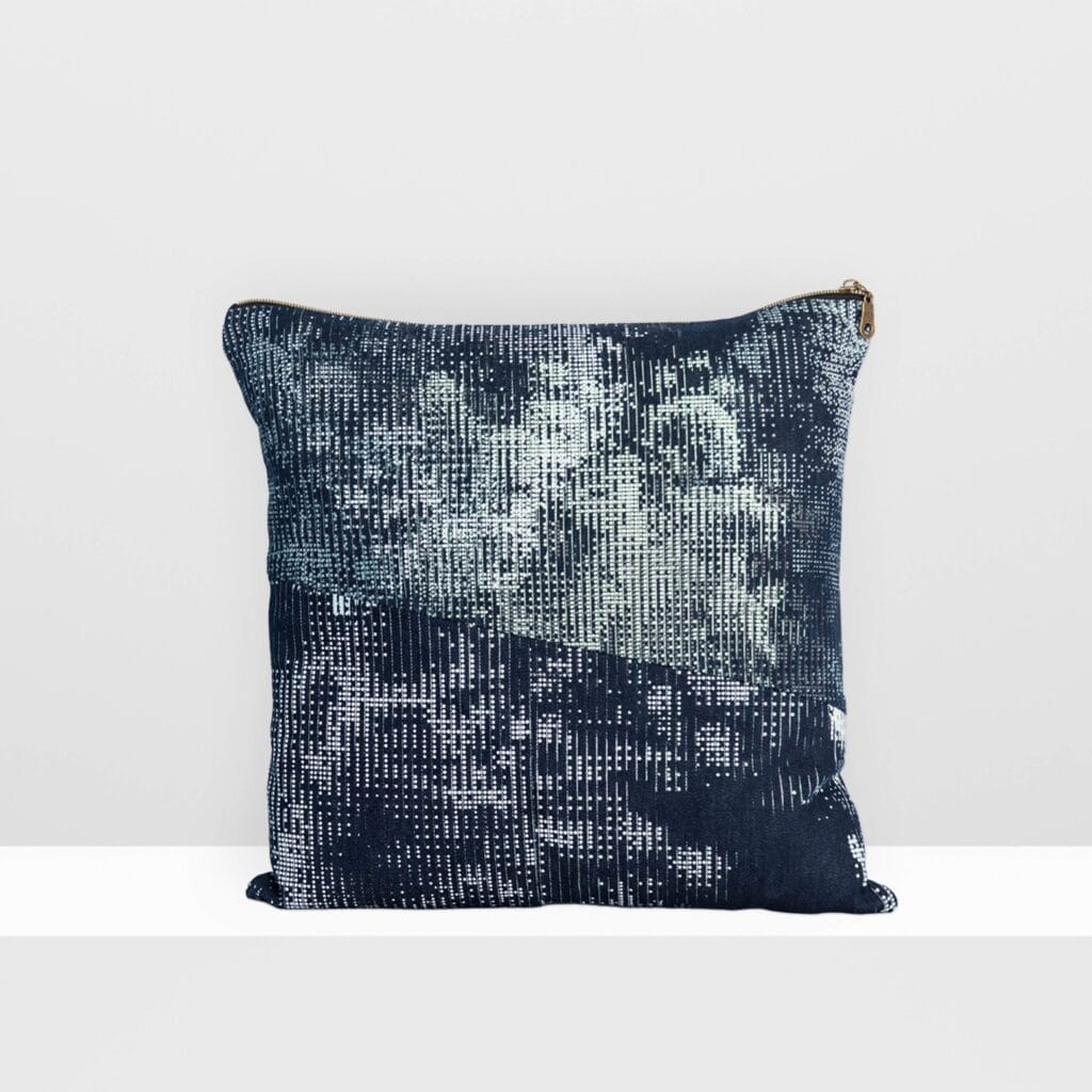 Front view of Digital Moss medium pillow by MIN-studio, screen-printed denim with layered abstract moss-like textures in blue, white, grey, and glow yellow inks.