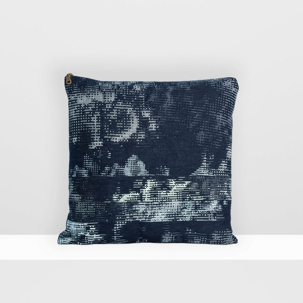 Front view of Digital Moss medium pillow by MIN-studio, screen-printed denim with layered abstract moss-like textures in blue, white, grey, and glow yellow inks.